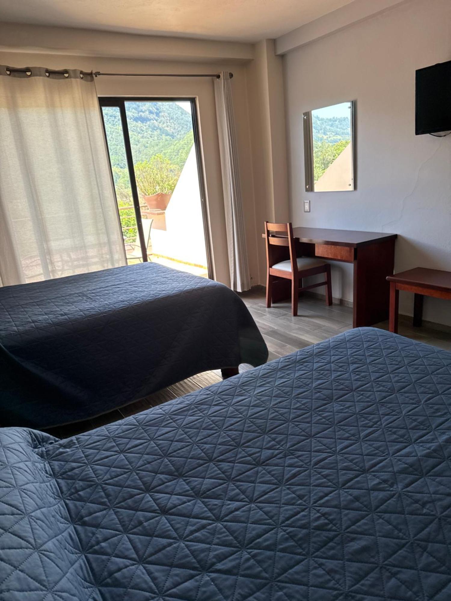 Hotel Suites Don Miguel Тлатлаукитепек Экстерьер фото